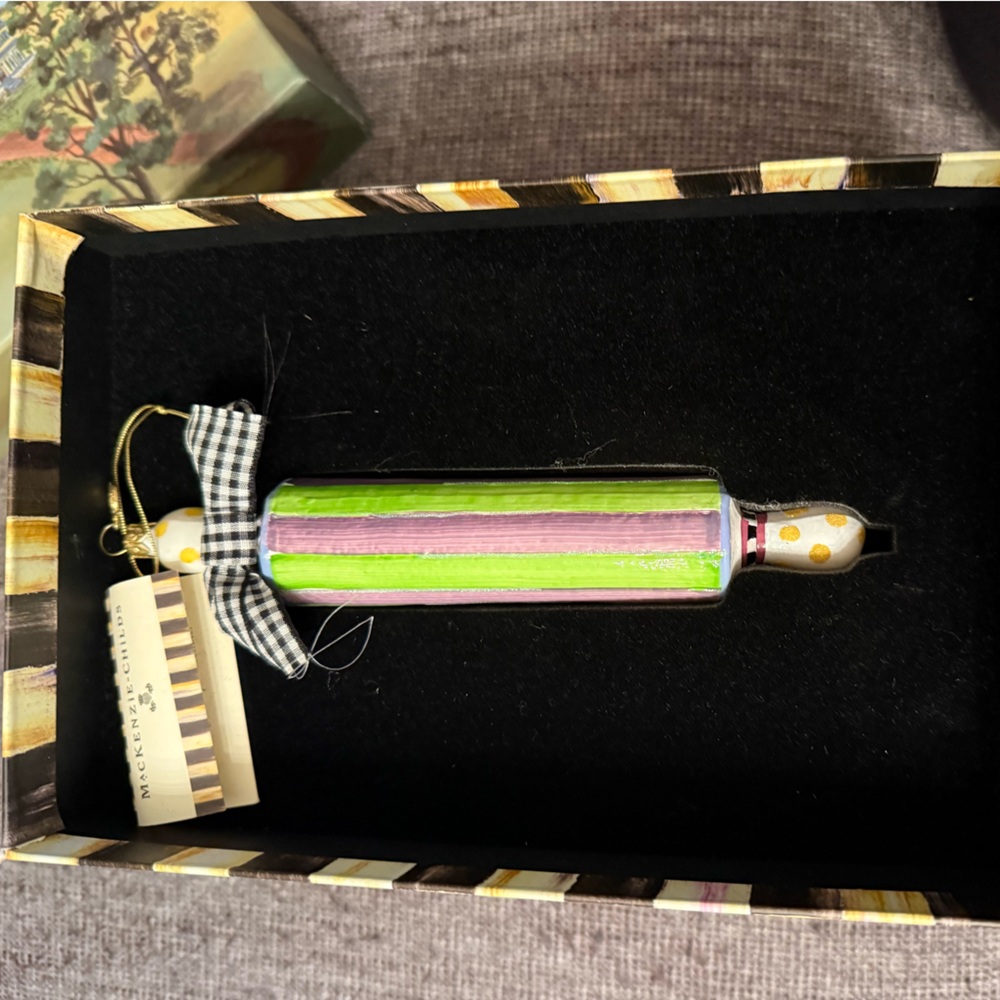 Mackenzie-Childs retired rolling in ornament